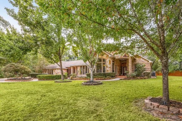 a view of a playground with basketball court