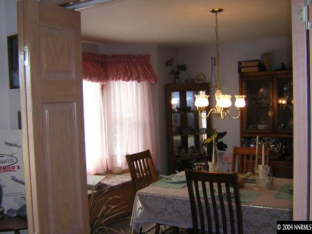 10101 Osage Road Reno, NV 89508 - Photo 5 of 9 a view of a livingroom with furniture and window