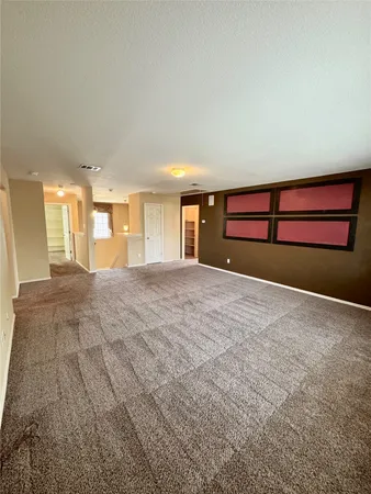 a view of empty room with a yard