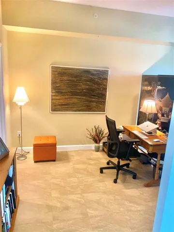 a living room with a couch and a coffee table