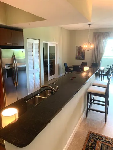 a lobby with furniture and window