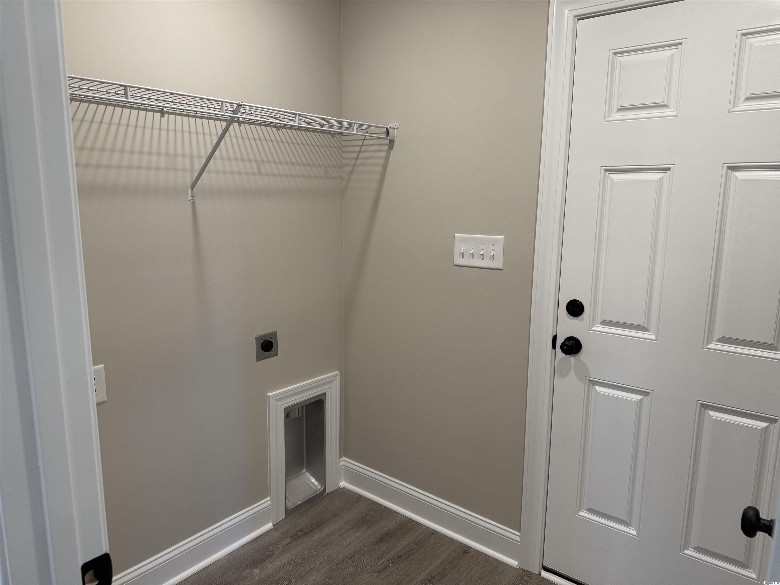 242 Country Club Road Marion, SC 29571 - Photo 33 of 33 Laundry room featuring dark wood finished floors and electric dryer hookup