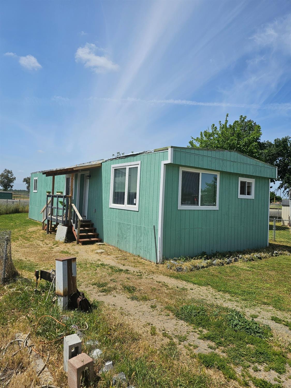 46 Arizona Way Olivehurst, CA 95961 - Photo 20 of 21 a view of a house with backyard porch and sitting area