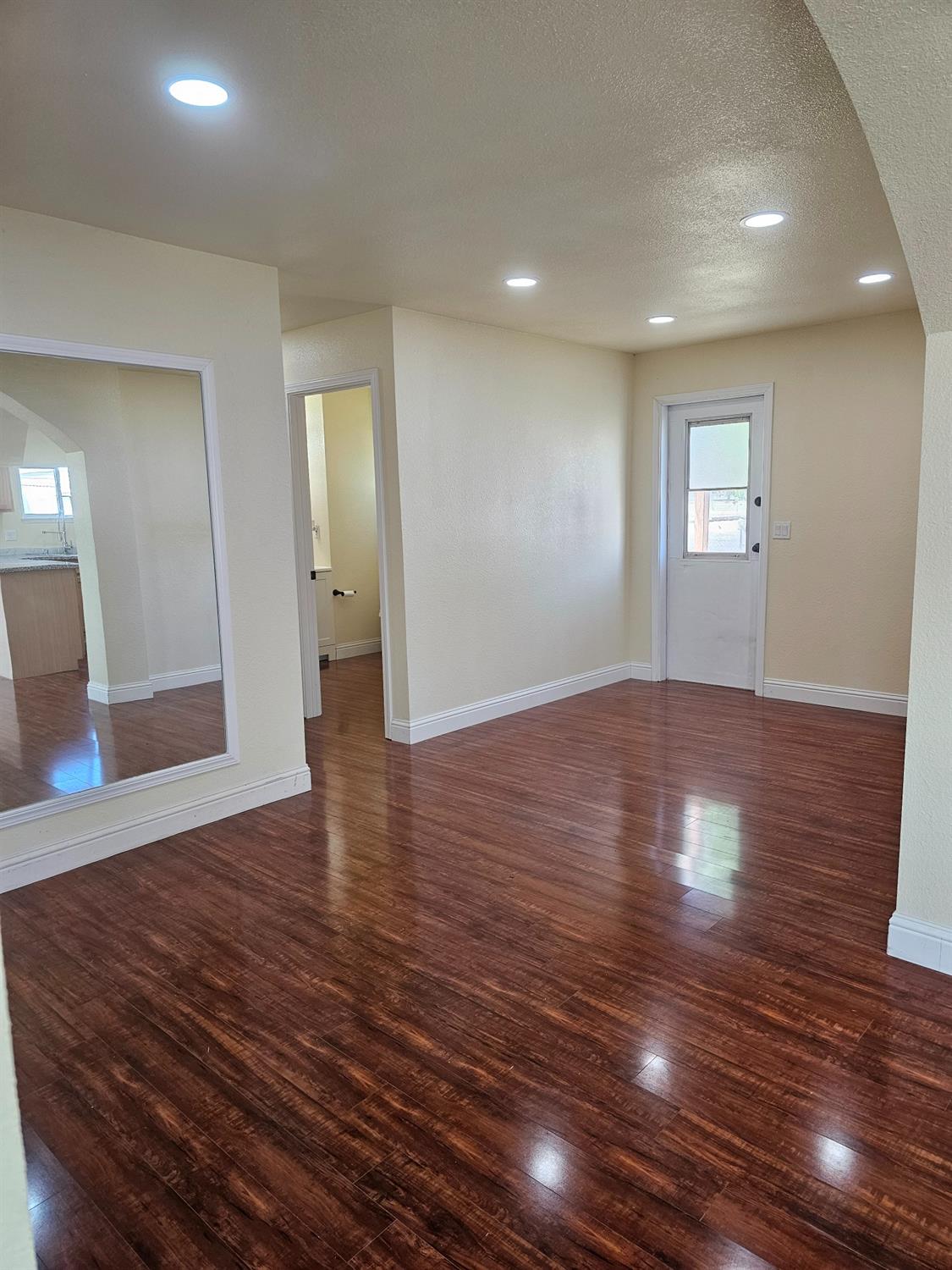 46 Arizona Way Olivehurst, CA 95961 - Photo 4 of 21 a view of an empty room with wooden floor