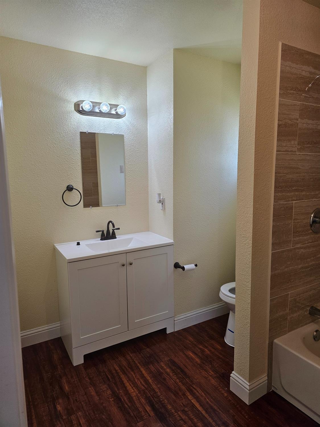 46 Arizona Way Olivehurst, CA 95961 - Photo 8 of 21 a bathroom with a sink a toilet and shower