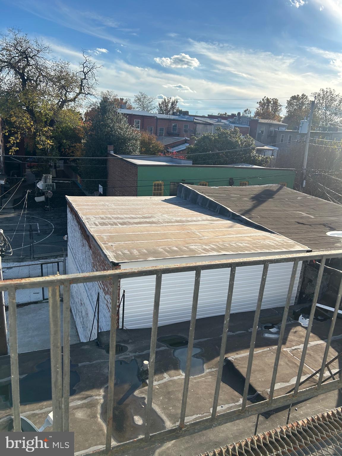 1413 West Baltimore Street, Unit 7 Baltimore, MD 21223 - Photo 6 of 6 a terrace with outdoor seating and city view