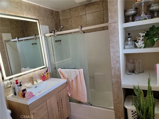 a bathroom with a sink and toilet