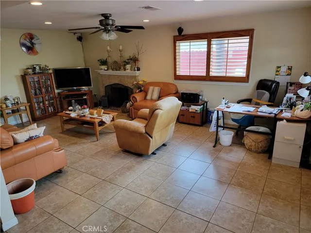 a kitchen with granite countertop a refrigerator and a stove