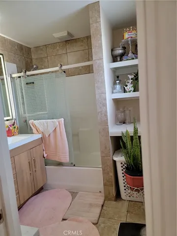 a view of a hardwood floor and sitting space