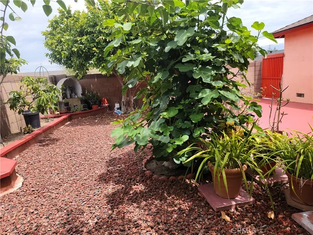 a view of backyard with green space