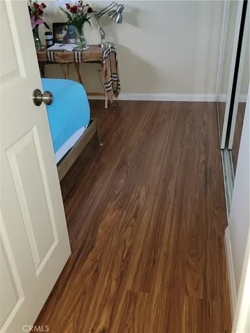 a kitchen with stainless steel appliances granite countertop a refrigerator stove and sink