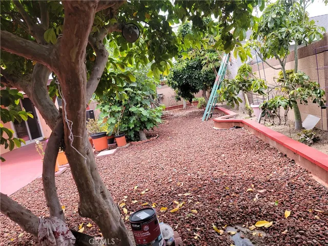 a kitchen with stainless steel appliances granite countertop a stove microwave and cabinets