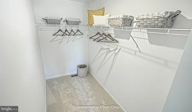 a view of a room with racks on the wall