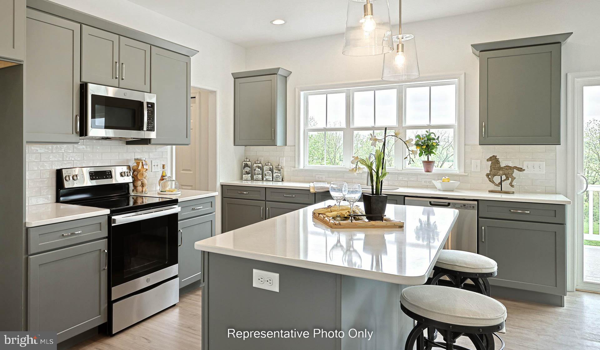 828 Kimmerlings Road Lebanon, PA 17046 - Photo 6 of 24 a kitchen with a sink stove and microwave