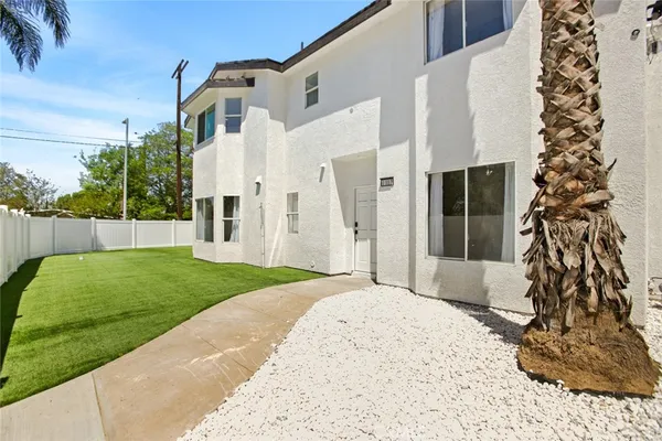 a view of a back yard of the house