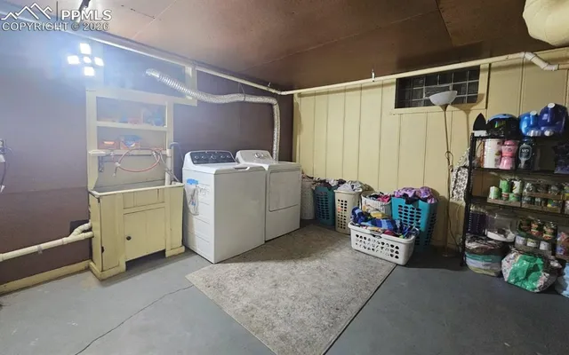 a utility room with dryer and washer