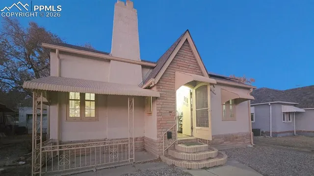 a front view of a house with a porch