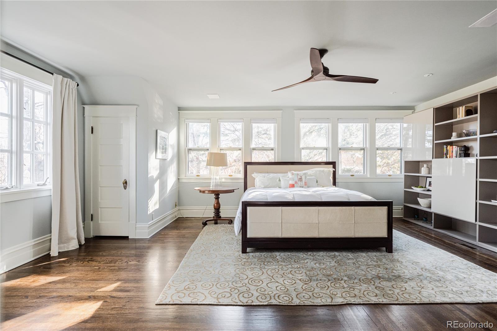870 12th Street Boulder, CO 80302 - Photo 23 of 34 a spacious bedroom with a bed a window and closet