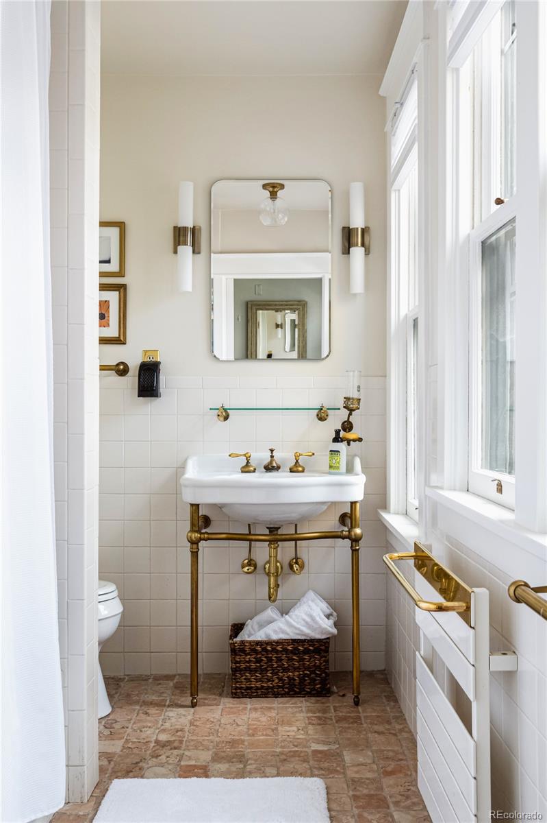 870 12th Street Boulder, CO 80302 - Photo 24 of 34 a bathroom with a sink and a mirror