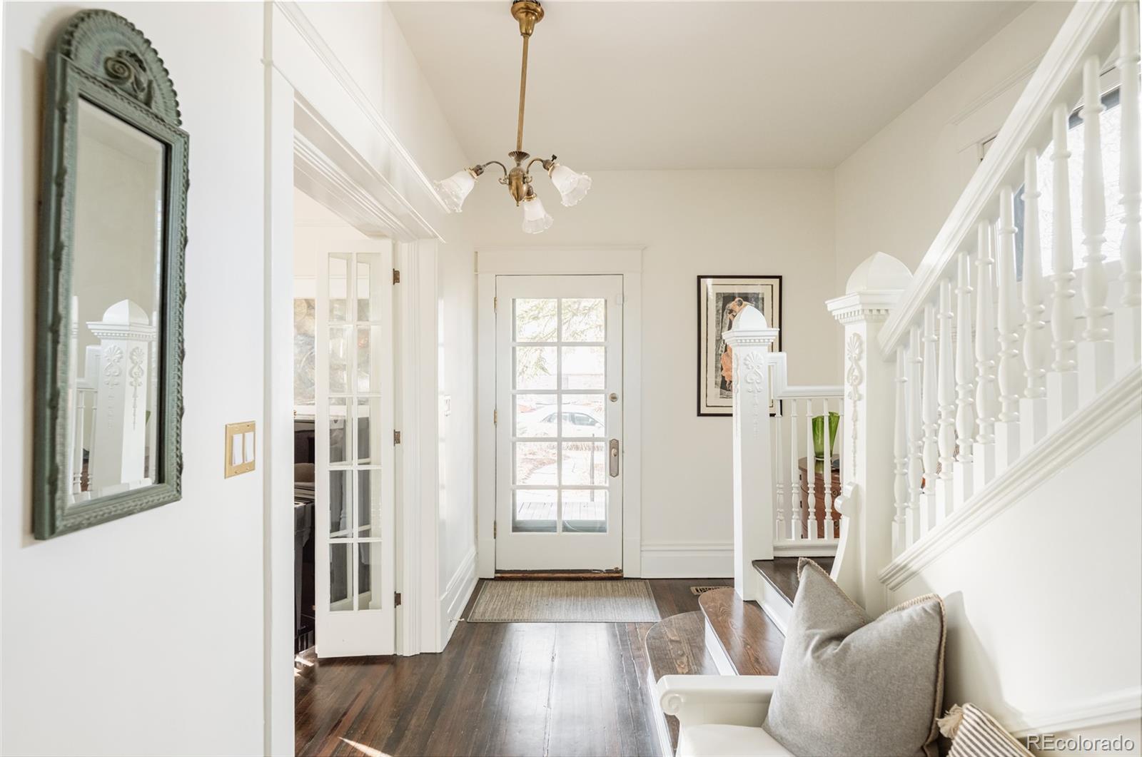 870 12th Street Boulder, CO 80302 - Photo 5 of 34 a view of a livingroom with wooden floor and entryway
