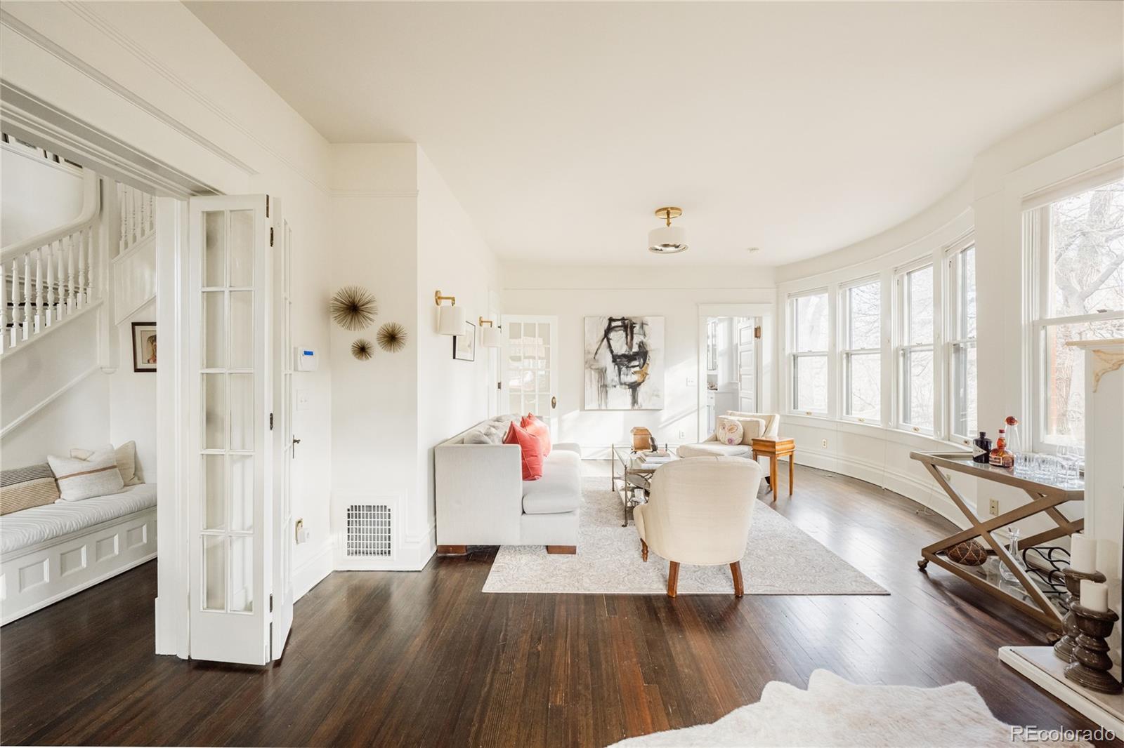 870 12th Street Boulder, CO 80302 - Photo 7 of 34 a living room with furniture large window and wooden floor