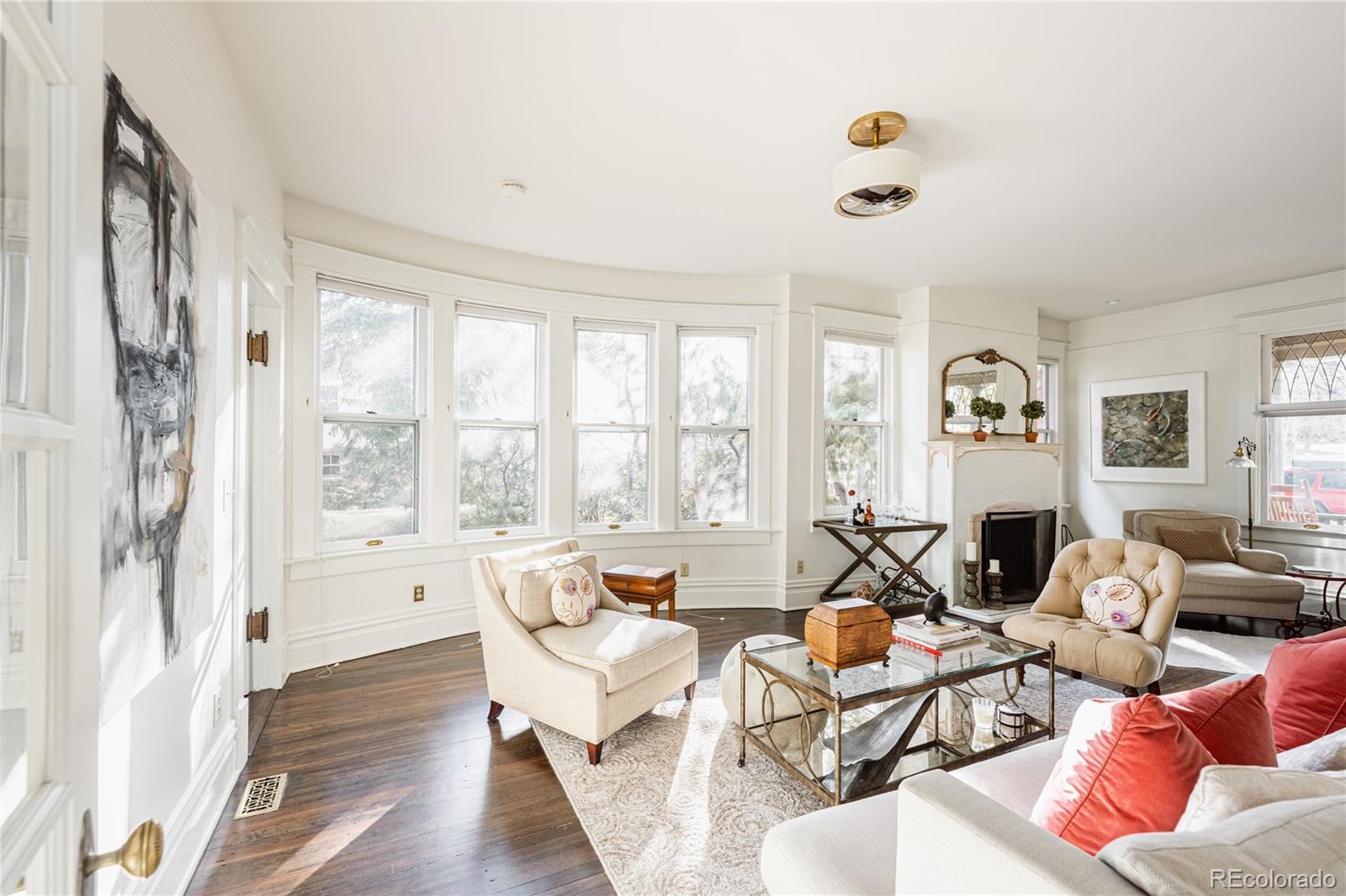 870 12th Street Boulder, CO 80302 - Photo 9 of 34 a living room with fireplace furniture and a large window