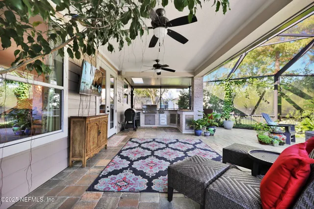 a view of a backyard with sitting area