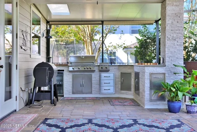 a view of a swimming pool with a patio