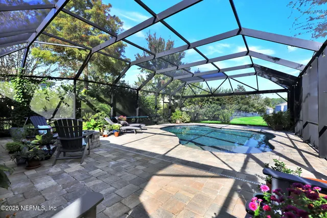 a view of a park with large trees