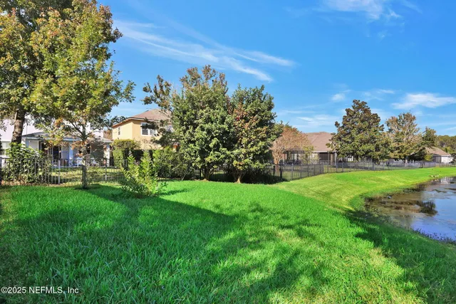 a view of a lake with a city