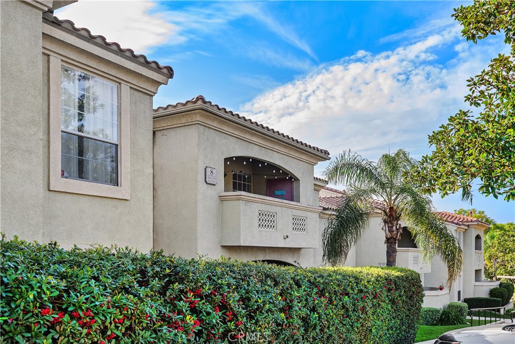 375 Central Avenue, Unit 78 Riverside, CA 92507 - Photo 2 of 43 a front view of a house with balcony