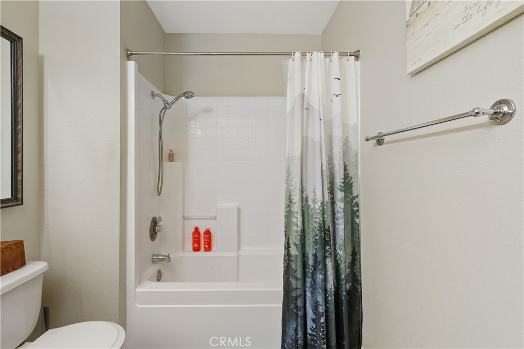 375 Central Avenue, Unit 78 Riverside, CA 92507 - Photo 25 of 43 a bathroom with a shower a toilet and a shower