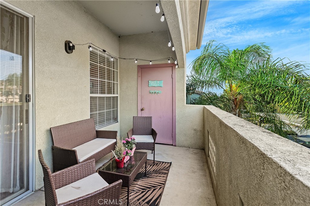 375 Central Avenue, Unit 78 Riverside, CA 92507 - Photo 28 of 43 a balcony with furniture and a potted plant