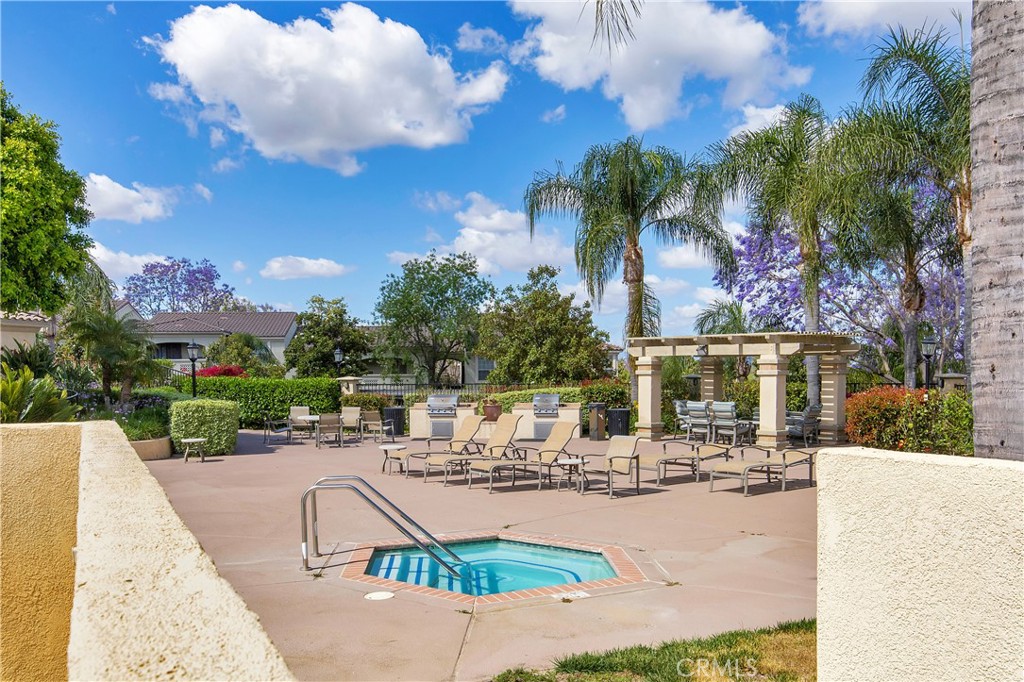 375 Central Avenue, Unit 78 Riverside, CA 92507 - Photo 39 of 43 a view of a swimming pool with a patio