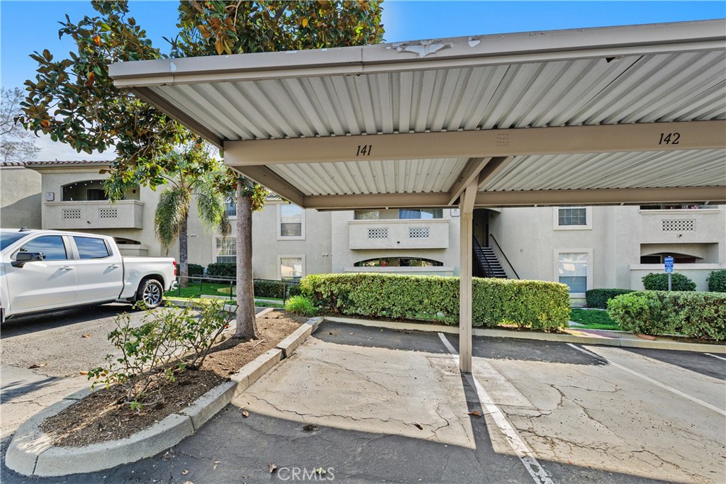 375 Central Avenue, Unit 78 Riverside, CA 92507 - Photo 42 of 43 a front view of a house with garden