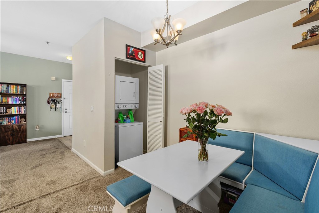 375 Central Avenue, Unit 78 Riverside, CA 92507 - Photo 9 of 43 a view of a dining room with furniture and wooden floor