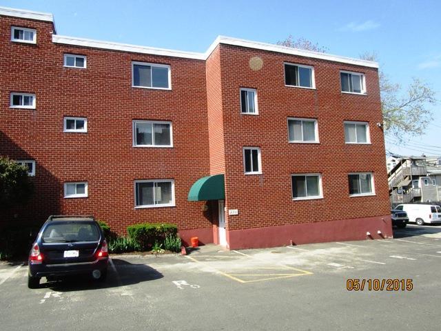 18 Prospect Street, Unit A6 Norwalk, CT 06850 - Photo 1 of 1 a car parked in front of a building