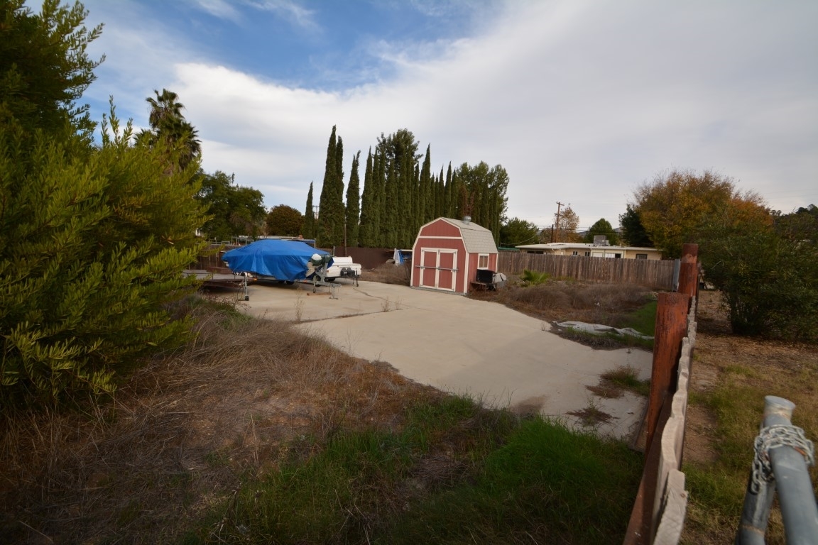 13634 Midland Road Poway, CA 92064 - Photo 13 of 13 Back half of rear yard for horses, more cars, barn, new home.......