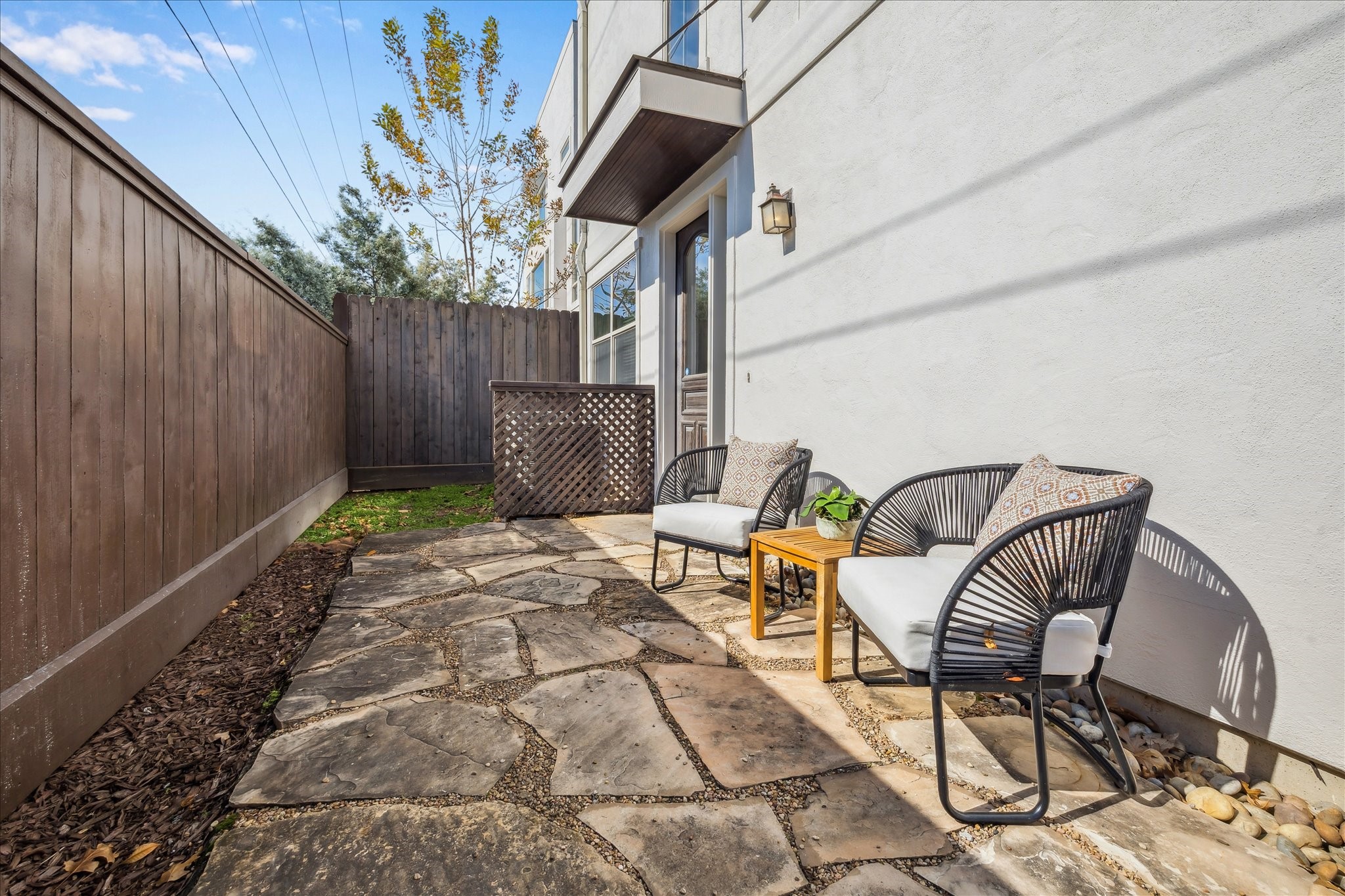 303 Bethje Street Houston, TX 77007 - Photo 22 of 25 a backyard of a house with table and chairs
