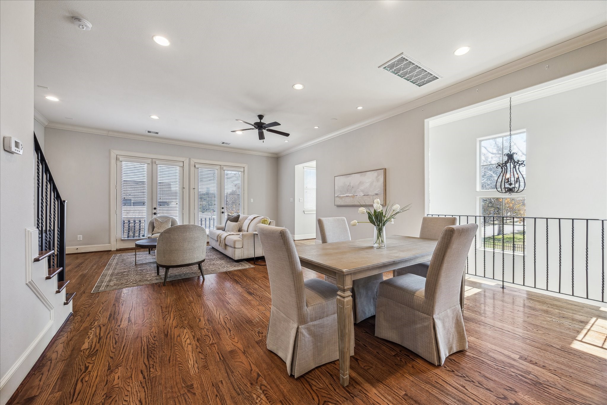 303 Bethje Street Houston, TX 77007 - Photo 5 of 25 a view of a dining room with furniture window and wooden floor