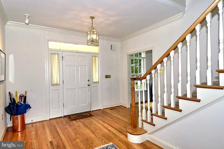 710 South River Landing Road, Unit 710 Edgewater, MD 21037 - Photo 15 of 30 Foyer Showcasing Hardwood Floors