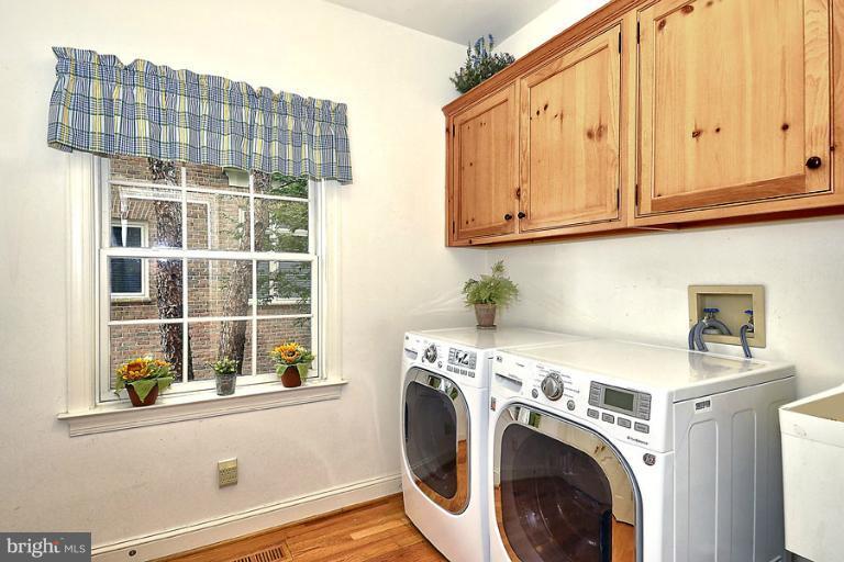 710 South River Landing Road, Unit 710 Edgewater, MD 21037 - Photo 17 of 30 Sizable Laundry Room with Storage