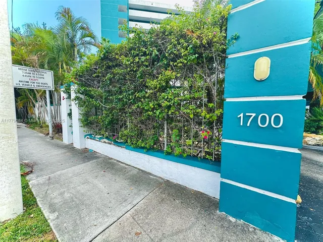 a view of a street sign of a building