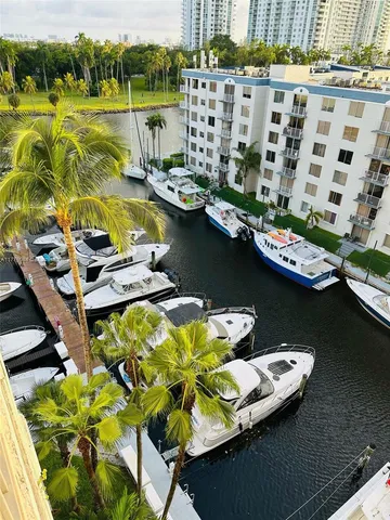 a view of a balcony with chairs