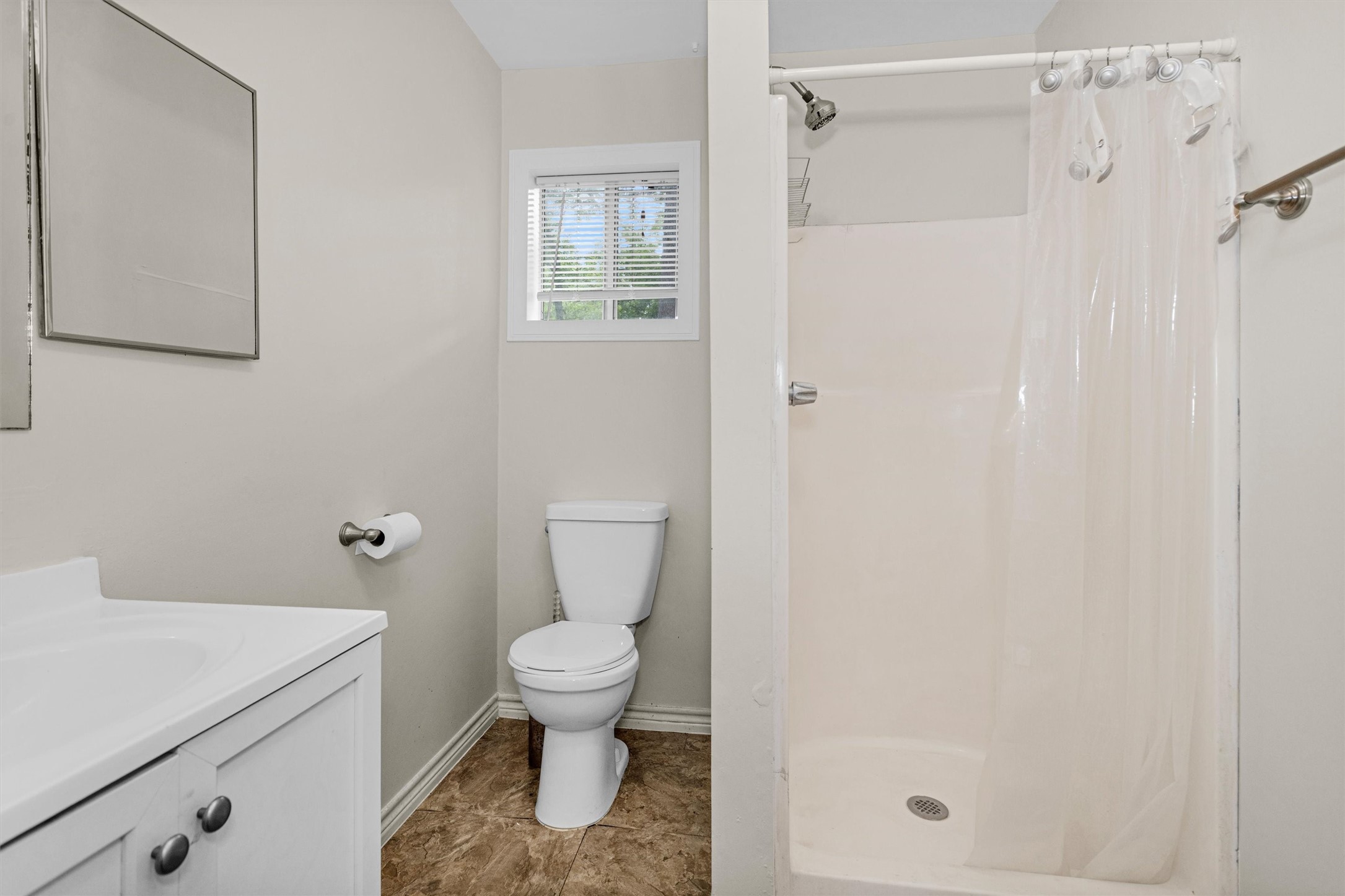 99 Main Street Huntsville, TX 77340 - Photo 31 of 47 Secondary full bathroom features a walk in shower.