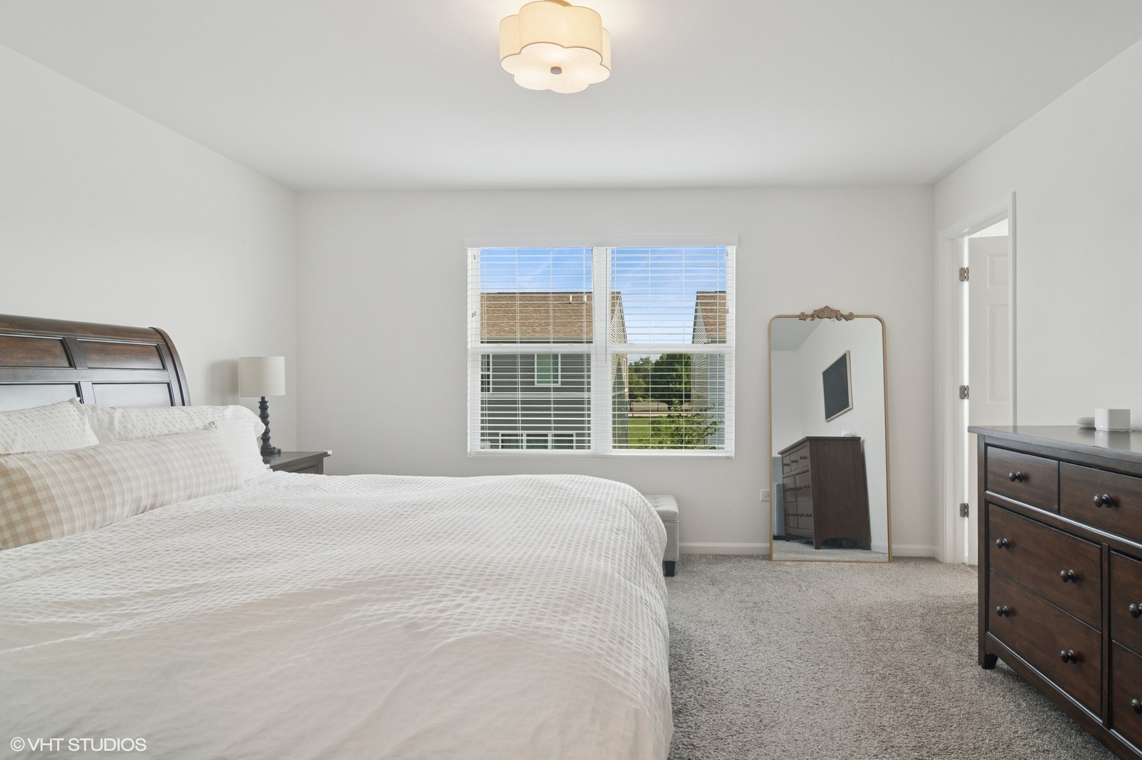 2709 Lily Lane Rolling Meadows, IL 60008 - Photo 11 of 18 a bedroom with a bed and a window