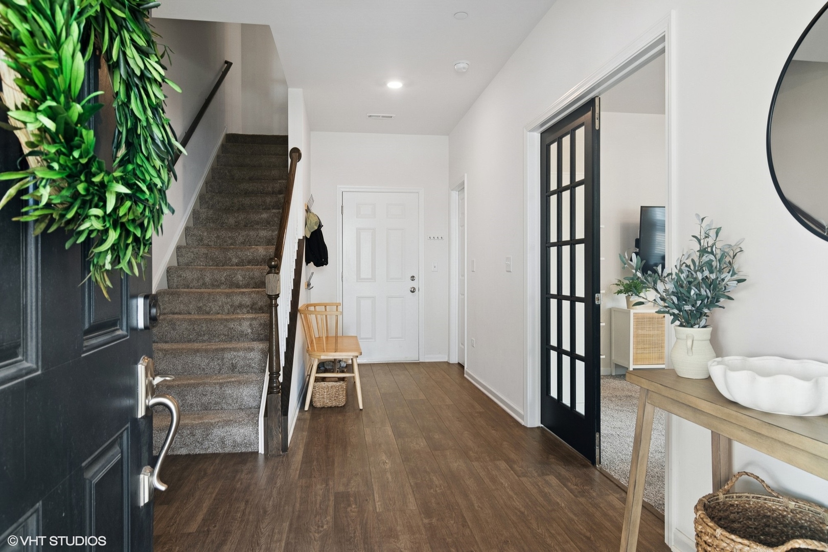 2709 Lily Lane Rolling Meadows, IL 60008 - Photo 2 of 18 a view of entryway with wooden floor and stairs