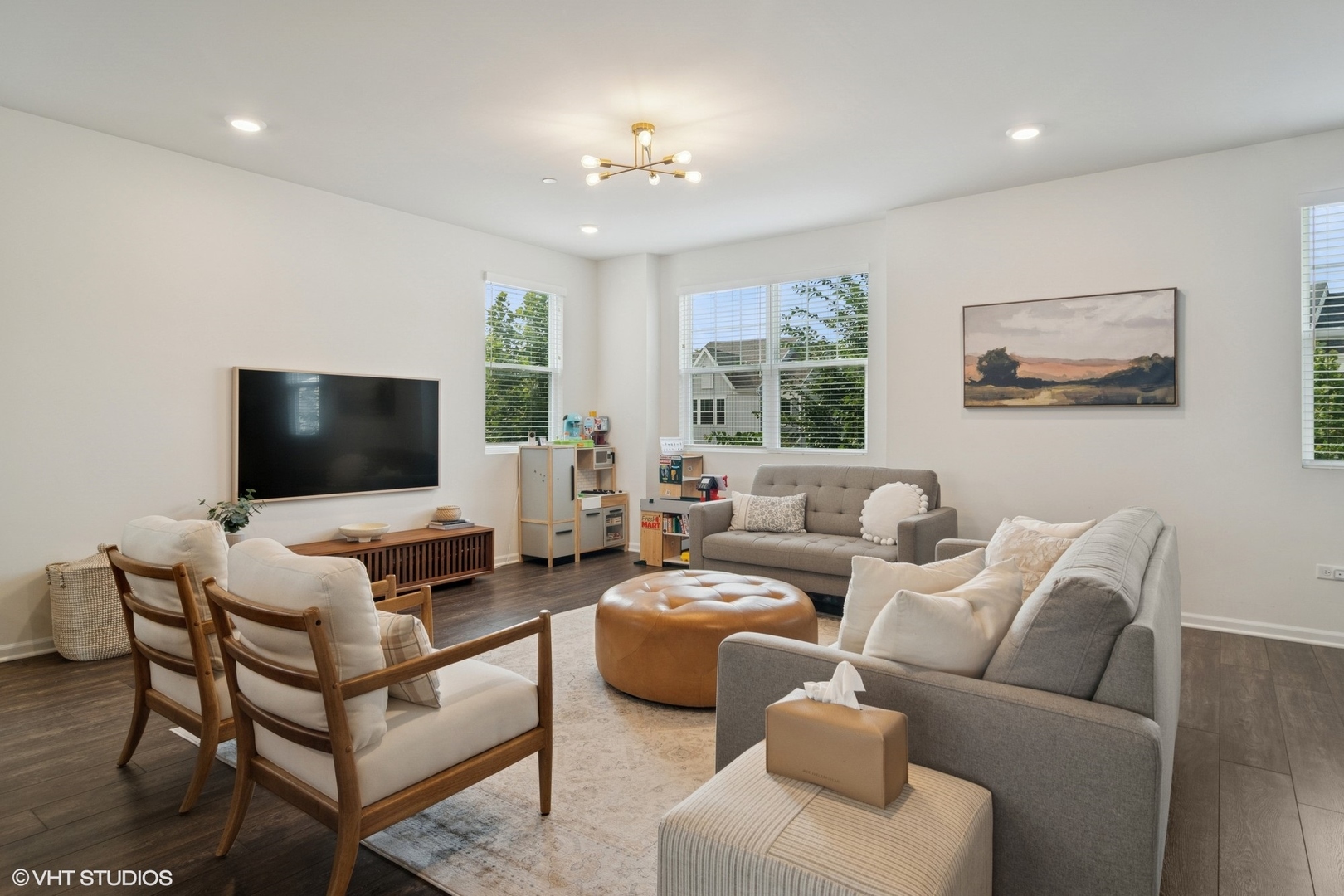2709 Lily Lane Rolling Meadows, IL 60008 - Photo 5 of 18 a living room with furniture and a flat screen tv