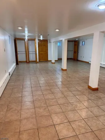 a view of a hallway with an empty room
