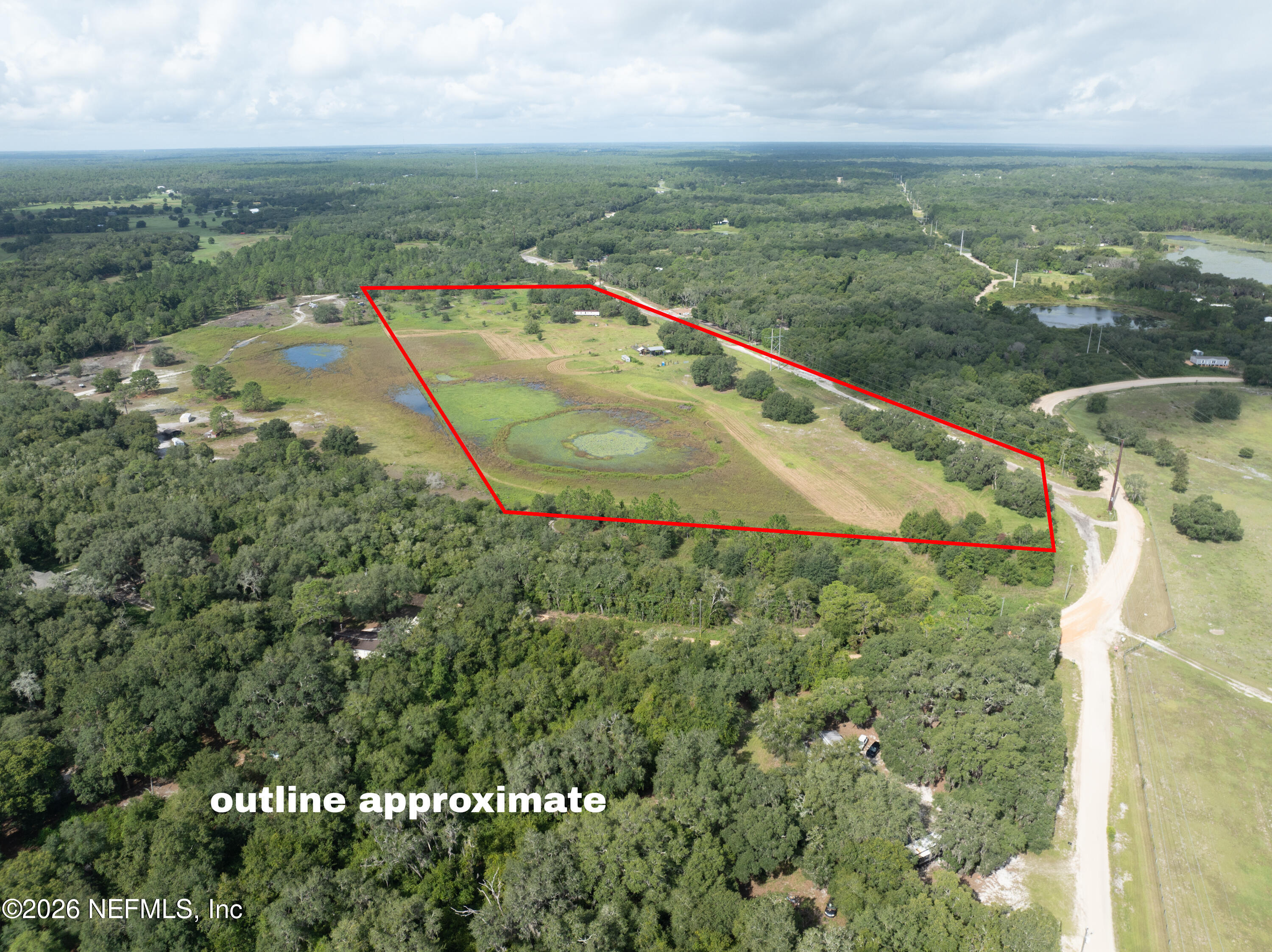 7670 Bundy Lake Road Keystone Heights, FL 32656 - Photo 15 of 22 an aerial view of residential houses with outdoor space and river
